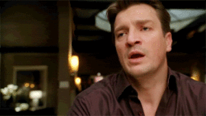 Nathan Fillion was about to make a comment, then he closed his mouth and set his head on his chin as if to say "you know what, never mind."